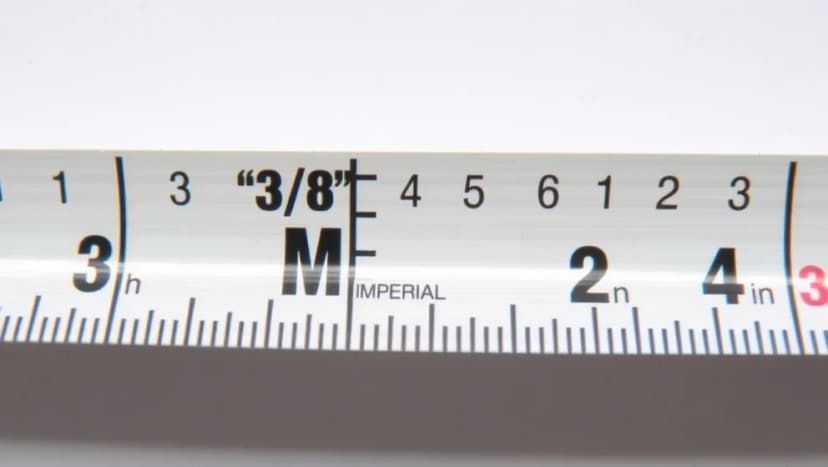 Vad är 3/8 tum i millimeter